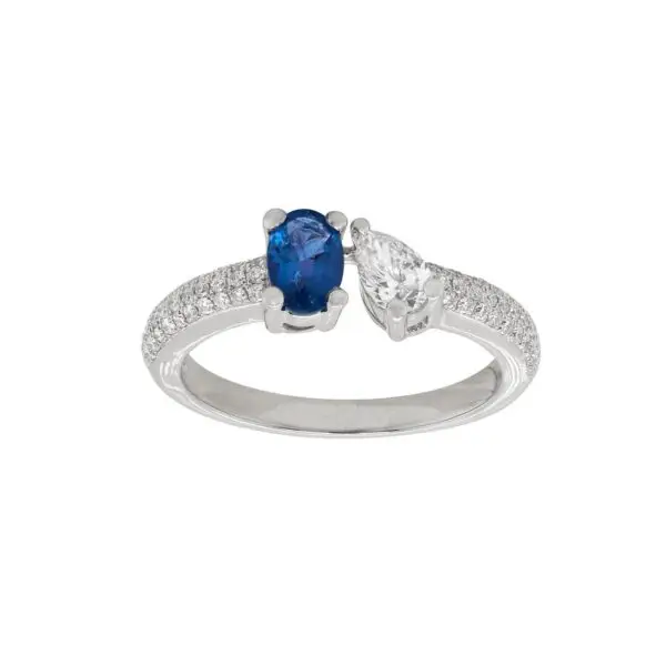 Contrarié Ring in White Gold with Round, Pear Shape Diamonds and Blue Sapphire